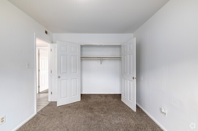 2BR, 1BA - 800SF - Primary Bedroom - Derita Woods Apartments