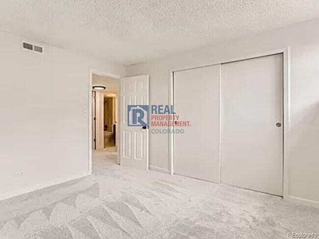 Building Photo - 9110 E Girard Ave