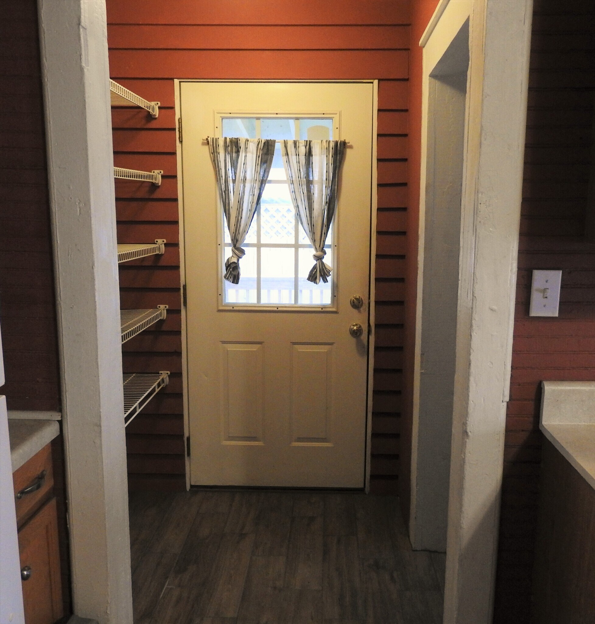 Back door, with pantry/linen storage in the mudroom, laundry room to the right. - 3230 PARK AVE