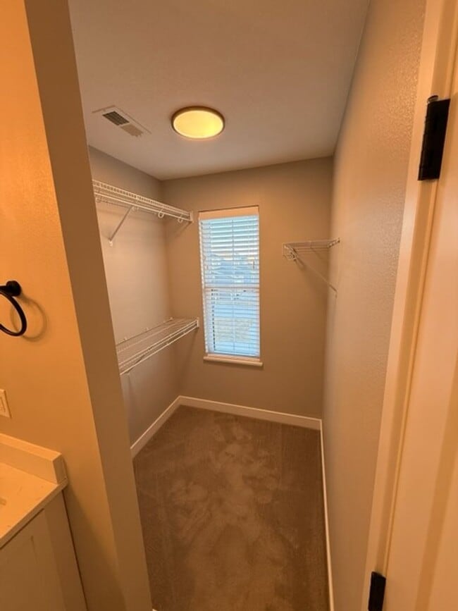 Building Photo - Spacious 4-Bedroom Home with 2-Car Garage & Yard