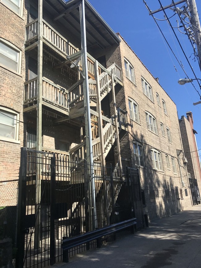 Building Photo - 7105-7111 S Champlain Ave
