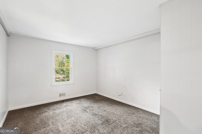 Building Photo - 5659 Whispering Pines Rd