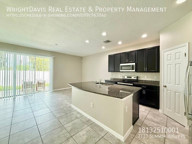 Building Photo - 7123 Summer Holly Pl