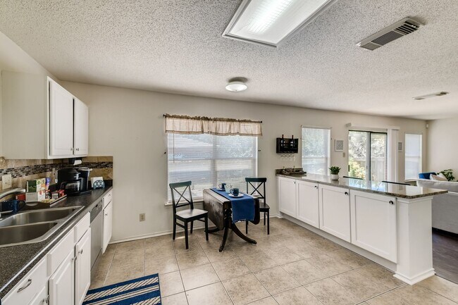 Building Photo - BEAUTIFUL HOME  |  OPEN CONCEPT  |  3 LIVING AREAS  |  FURNISHED OPTION  |  NEAR SCHOOLS & SHOPPING