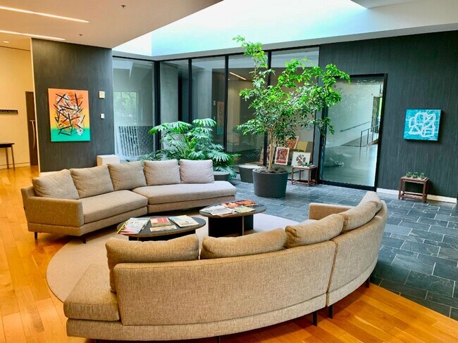 Building Photo - Effortless Downtown Living in the Heart of...