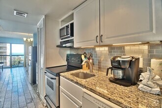 Building Photo - Charming Beach 1BR,  1.5Bath Condo in Myrt...