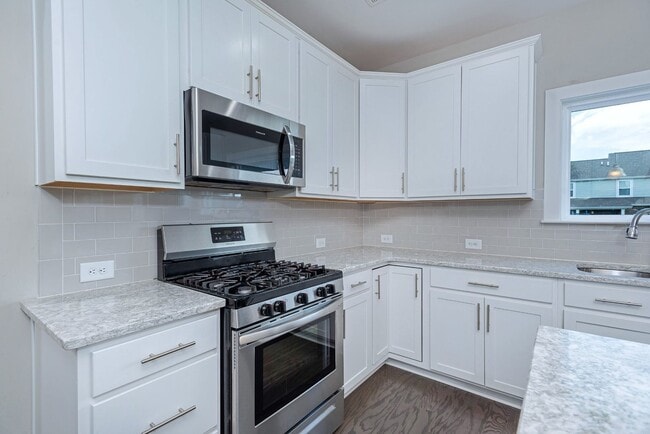 Building Photo - Room to Spread Out! 4BR, 3.5BA Home Near Liberty Creek Schools