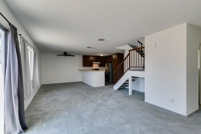 Building Photo - Double Primary Townhome with Spacious Backyard in 89115!