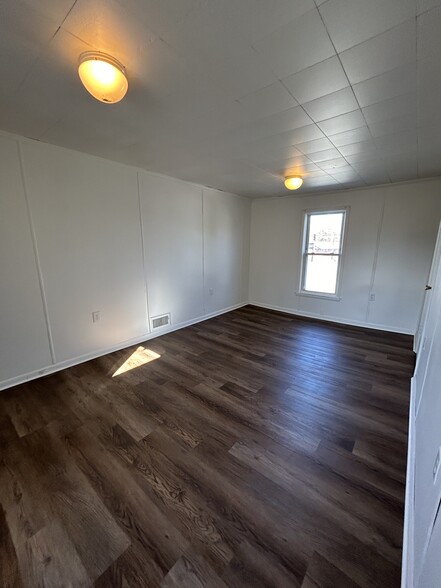 Bedroom 2 with walk up attic access - 100 S Main St