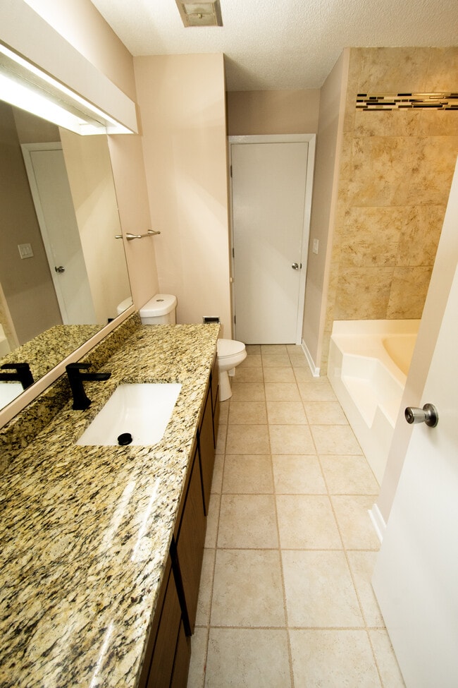 View of bathroom from Main Bedroom with linen closet - 115 Beechnut St