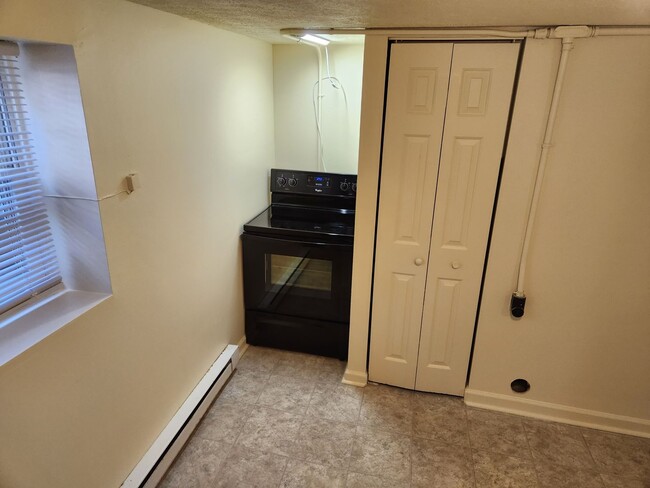 Building Photo - Affordable Apartment Outside the City Limits