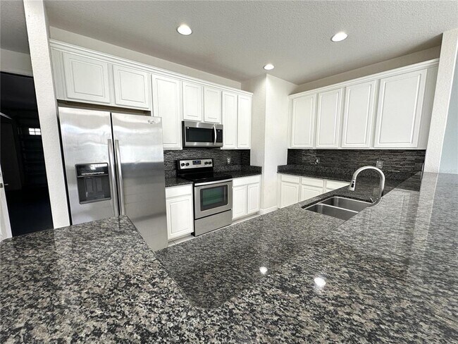 Building Photo - 8474 Kelsall Dr