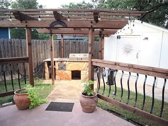 back yard built in bbq pit with pergola - 3811 Caleb Ct