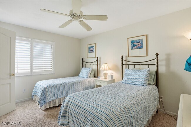 Building Photo - 7048 Pelican Bay Blvd