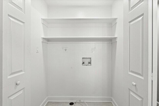 Efficiently designed laundry nook perfect for urban living. - 5580 West 4th Avenue Townhomes