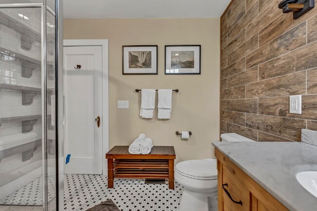 Building Photo - Furnished 1-Bedroom Lower Apartment on Main St