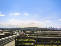 Building Photo - Modern Top-Floor Condo in U-District