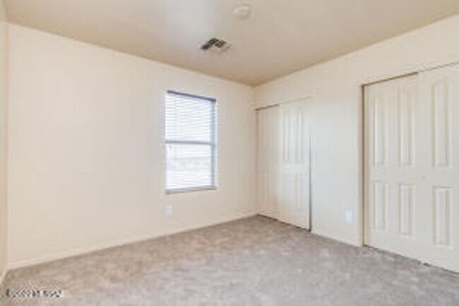 Building Photo - Spacious 4-Bedroom Retreat Near Raytheon & DMAFB