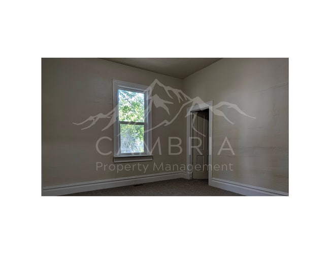 Building Photo - Charming 4-BR Home in Midvale