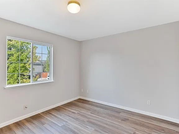 Building Photo - This is a lovely halfplex with 2 stories, 3 bedrooms, and 2.5 bathrooms in a quiet HOA neighborhood