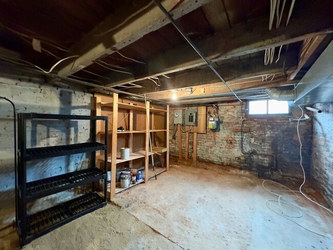 Building Photo - Charming 2 Bedroom/1 Bathroom Townhome with Deck and Parking Pad in South Baltimore!