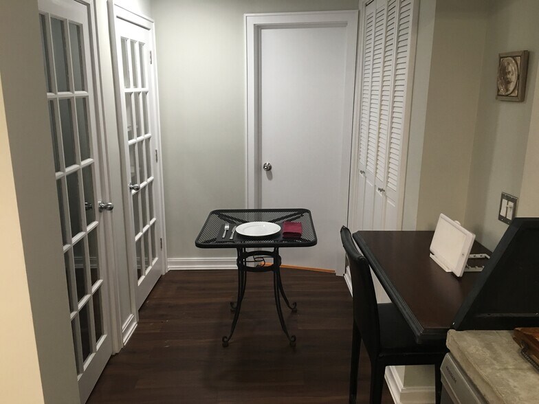 Separate dining alcove with 3 closets; walk-in cedar closet, large pantry, storage closet w/ shelves - 415 9th St