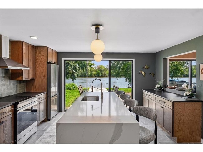 Building Photo - 5636 Twin Lake Terrace N