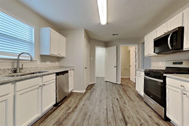 Building Photo - 7202 Winter Song Dr