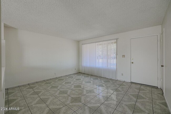 Building Photo - 3020 N 87th Ave