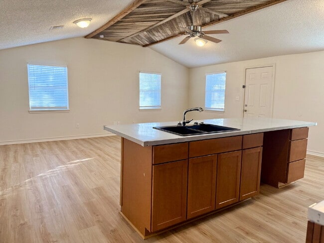 Building Photo - Modern Elegance Meets Location: High Ceilings, Updated Fixtures, Move-In Ready!