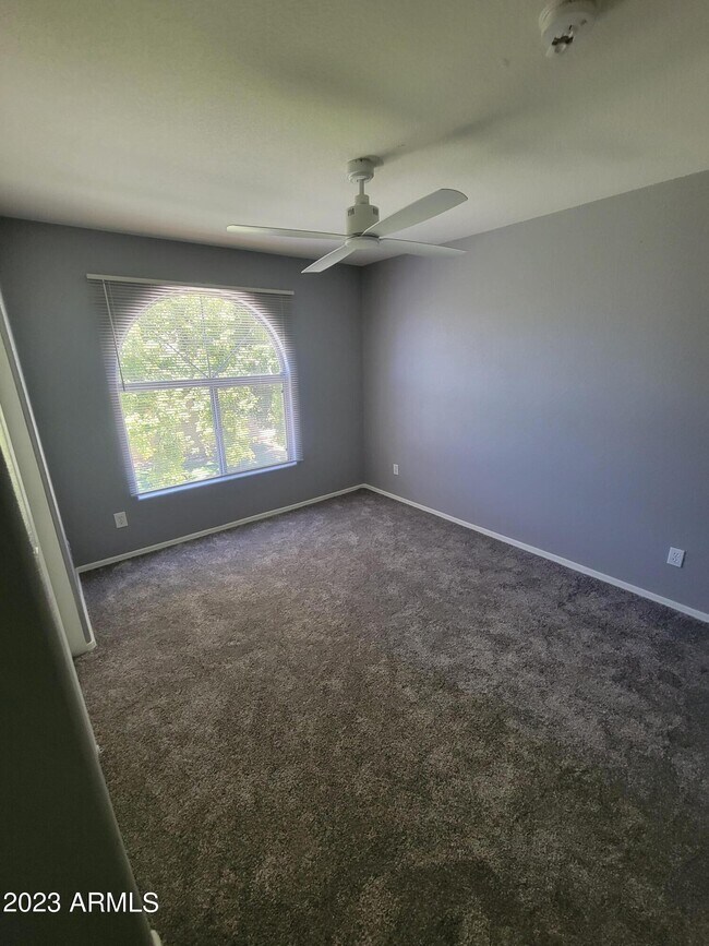 Building Photo - 5846 W Gelding Dr