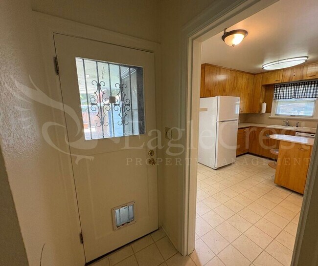 Building Photo - Three Bedroom, Two Bathroom House with Fenced Yard and Outdoor Fireplace