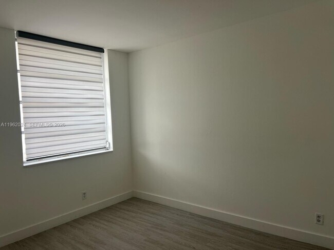 Building Photo - 8560 N Sherman Cir