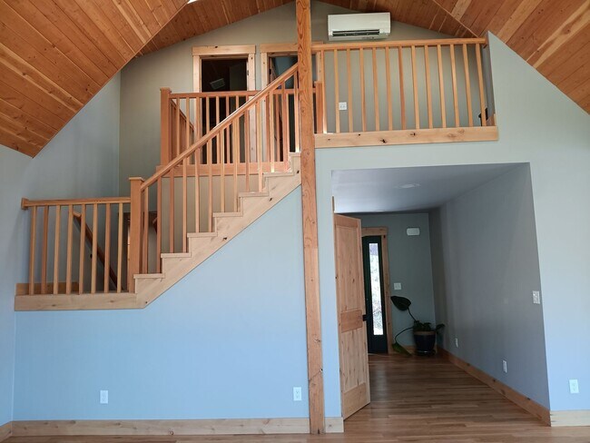 Building Photo - Beautiful Chalet Style Riverfront Property...