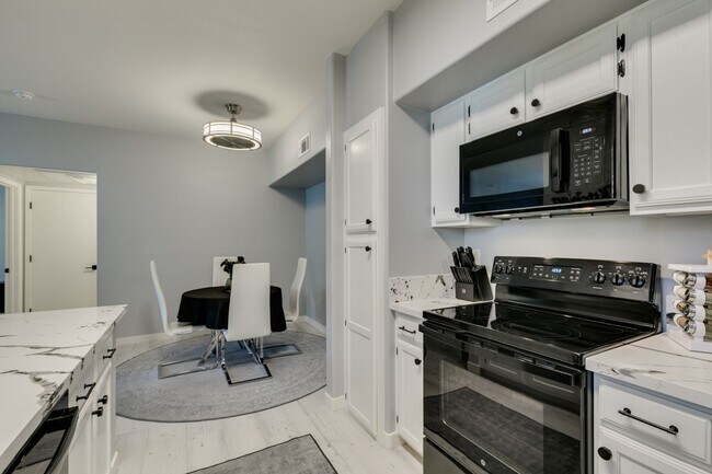 Building Photo - Stylish Fully Furnished 1BR Condo with Private Patio & Custom Closet