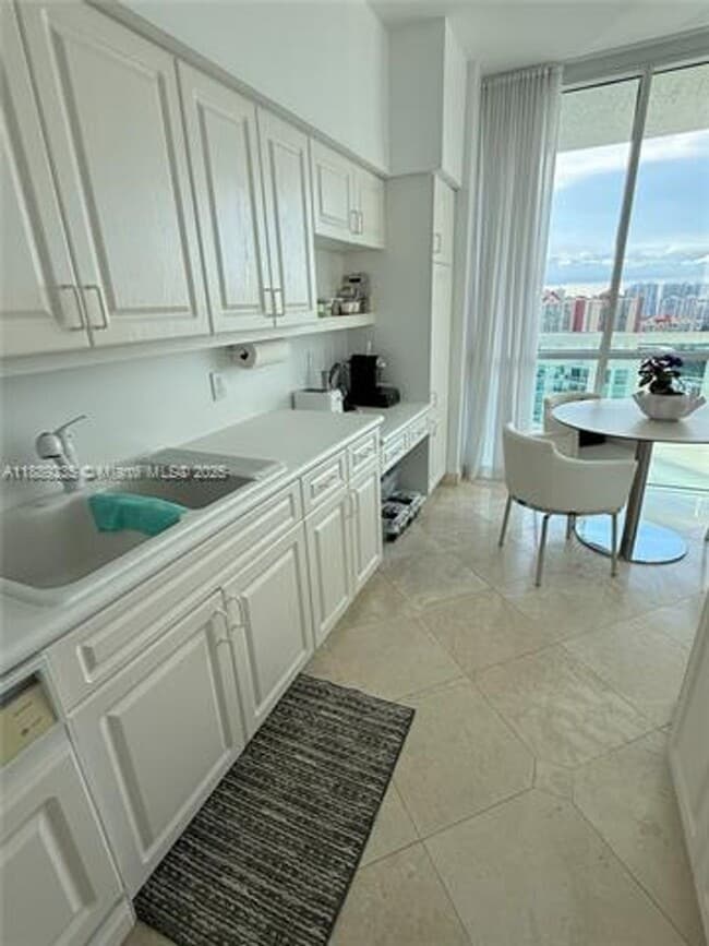 Building Photo - 16400 Collins Ave