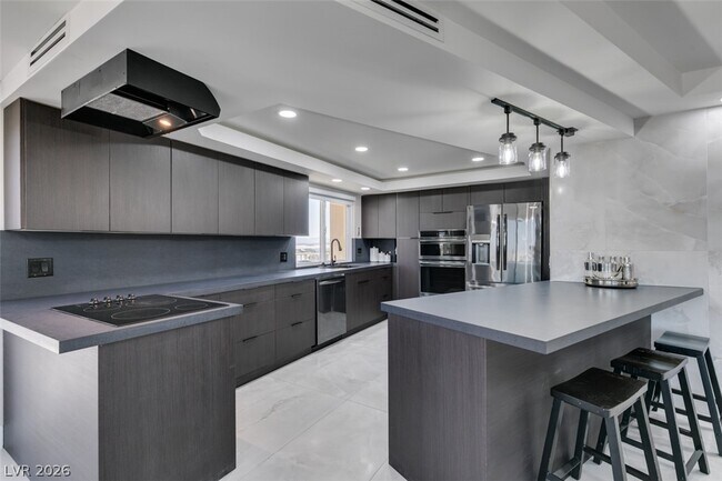 Building Photo - 205 E Harmon Ave