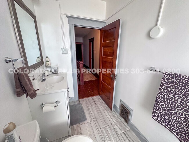 Building Photo - A home where old-world charm meets modern sophistication!