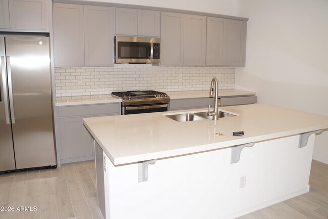 Building Photo - 3809 N 100th Dr