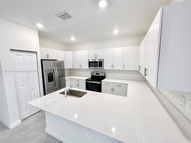 Building Photo - 11423 West 33rd Ct