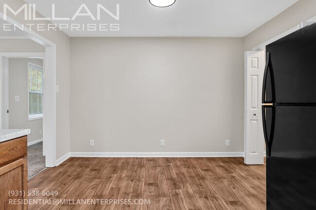 Building Photo - Charming Three Bedroom Home with Natural Privacy and Prime Location