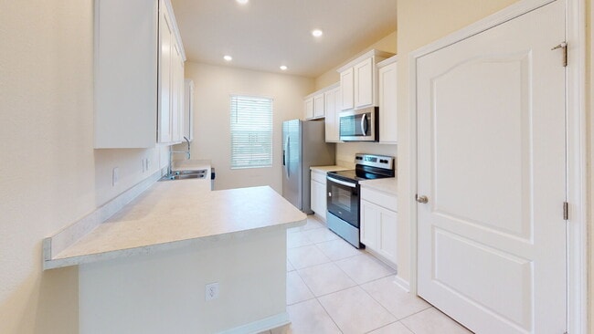 Building Photo - "Charming 3-Bedroom Townhouse Retreat on Oak Mill Road – Spacious 1308 Sq Ft with 2 Full Baths in...