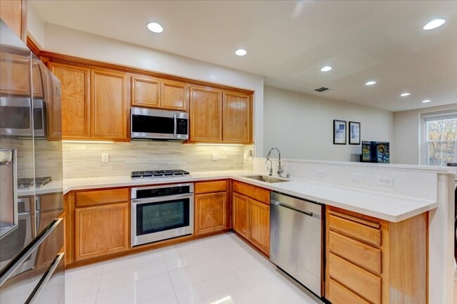 Building Photo - UPGRADED HOME IN HIGHLY CENTRAL SETTING.  RARE 3-BED/3-BATH FLOOR PLAN!