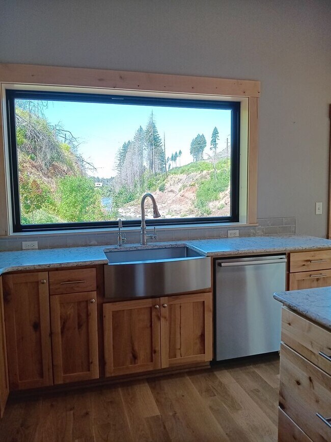 Building Photo - Beautiful Chalet Style Riverfront Property...