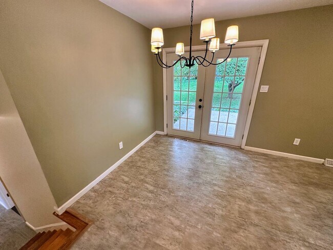 Building Photo - AVAILABLE NOW! Spacious 4 BR, 2 Bath House! Wood Floors, Attached Garage, W/D Included