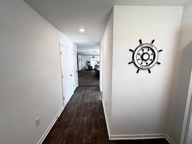 Building Photo - Picturesque Waterfront 4-Bedroom Home with...
