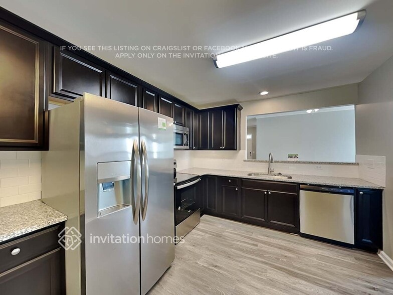 Building Photo - 6311 Trevor Simpson Dr