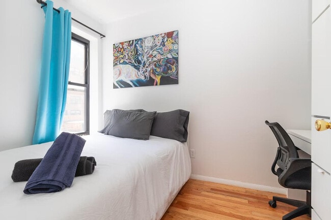 Building Photo - 306-318-318 E 96th St