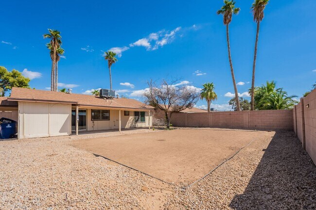 Building Photo - Three bedrooms plus big garage!