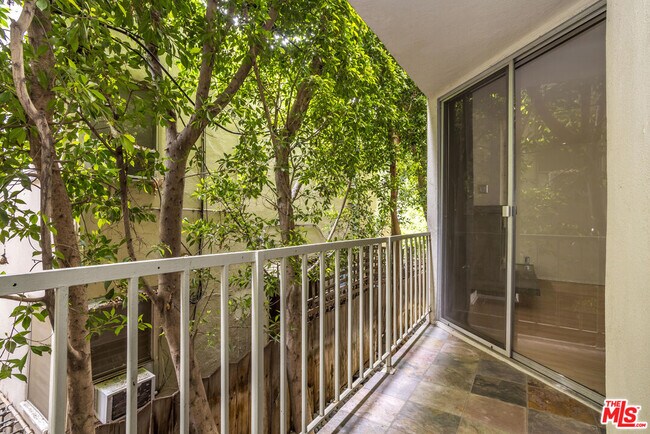 Building Photo - 1230 N Sweetzer Ave